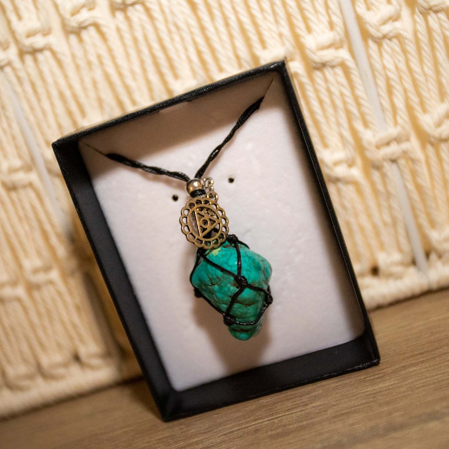 Adjustable black necklace with Turquoise Stone.